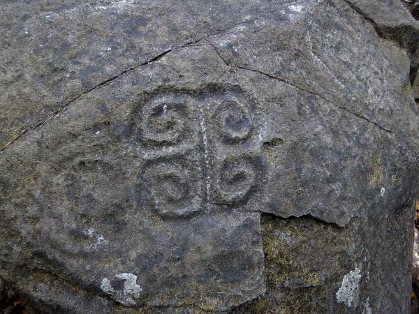 four armed squared spiral petroglyph